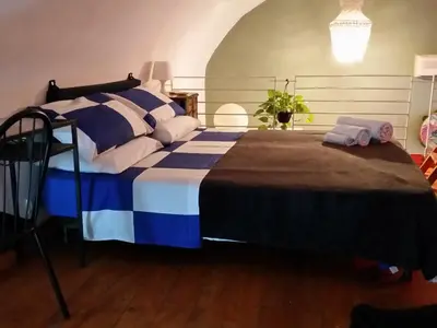 Letto o letti in una camera di Il Pozzo di Santa Teresa