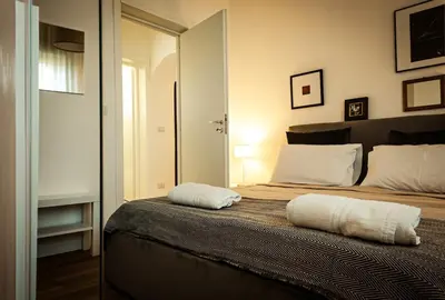 Letto o letti in una camera di Didi Home Isola Sicilia Villetta fronte spiaggia