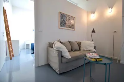Area soggiorno di Euripide Apartments