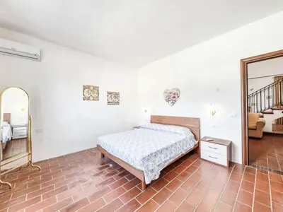 Letto o letti in una camera di Villa Giugiò by Interhome