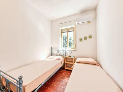 Letto o letti in una camera di Villa Giugiò by Interhome