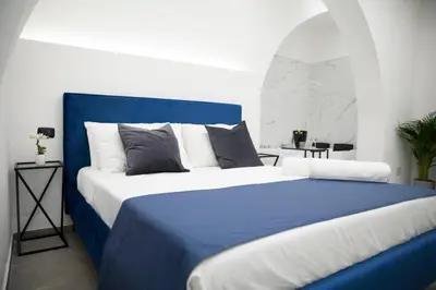 Letto o letti in una camera di La dimora di Adele Catania Centro