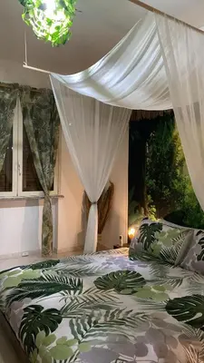 Letto o letti in una camera di Jungle - house of wellness