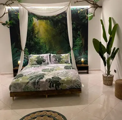 Letto o letti in una camera di Jungle - house of wellness