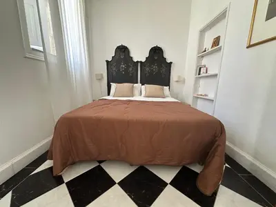 Letto o letti in una camera di Milonghita Apartment Ortigia by Ortigiaapartments