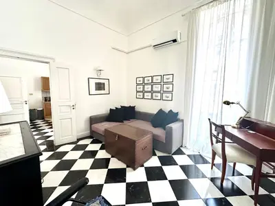 Area soggiorno di Milonghita Apartment Ortigia by Ortigiaapartments