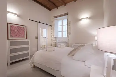Letto o letti in una camera di white lotus