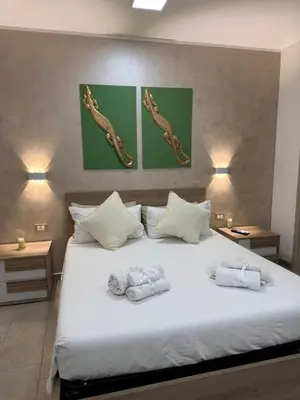Letto o letti in una camera di BLUE HOUSE Catania - Cozy B&B Near the Sea and Historic Center - Sicily