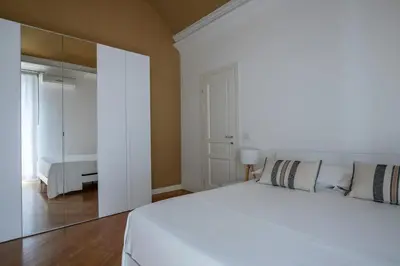 Letto o letti in una camera di VE Apartment by My Temporary Home
