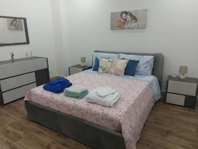 Letto o letti in una camera di Casa Dolce Casa