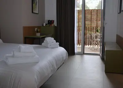 Letto o letti in una camera di Vittoria Rooms