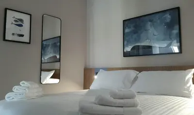 Letto o letti in una camera di Vittoria Rooms