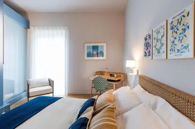 Letto o letti in una camera di Al Monumento
