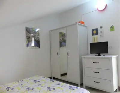 Letto o letti in una camera di Holidays Pantanello Solemar