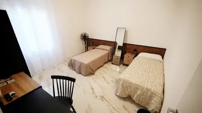 Letto o letti in una camera di Al Cortiletto
