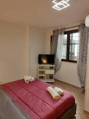 Letto o letti in una camera di Le case del cortile 3