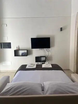 Letto o letti in una camera di Ermes Ares