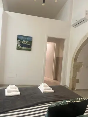 Letto o letti in una camera di Ermes Ares