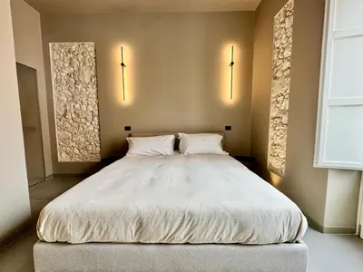 Letto o letti in una camera di Vittoria 61 Apartment
