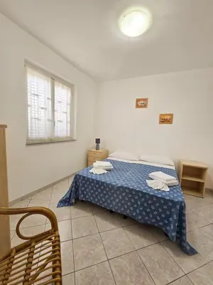 Letto o letti in una camera di Villa Clelia 400 meters from the beach