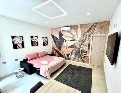 Letto o letti in una camera di Donna Concetta a Due passi da Ortigia