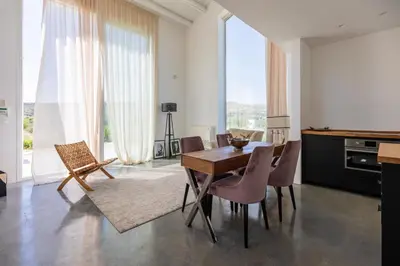 Area soggiorno di Amazing property of 2 villas on a land sea view