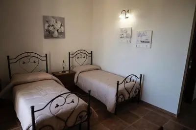 Letto o letti in una camera di La Goccia D'oro