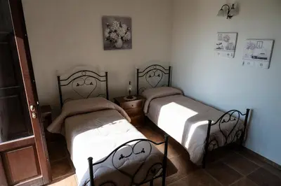 Letto o letti in una camera di La Goccia D'oro