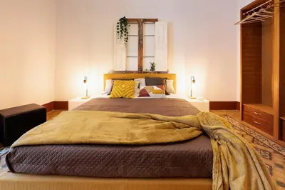 Letto o letti in una camera di Casa Officina