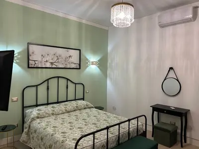 Letto o letti in una camera di Riviera Suite Via Eveneto, 47