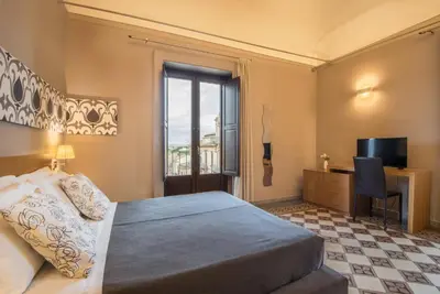 Letto o letti in una camera di Hotel Vittorio Veneto