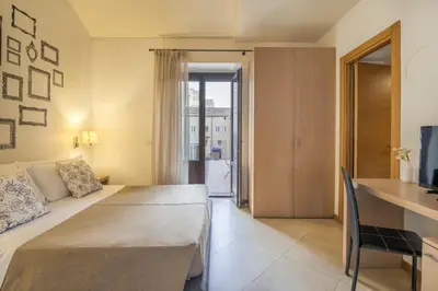 Letto o letti in una camera di Hotel Vittorio Veneto