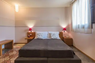 Letto o letti in una camera di Hotel Vittorio Veneto
