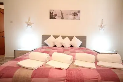 Letto o letti in una camera di Le Tre Rose Di Mary