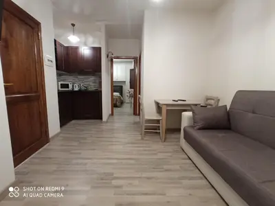 Area soggiorno di Il Duomo Apartment