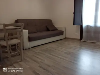 Area soggiorno di Il Duomo Apartment