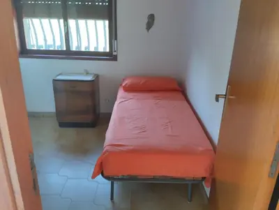 Letto o letti in una camera di Villa salvo