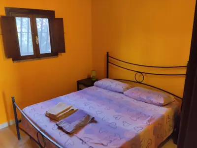 Letto o letti in una camera di Villa salvo