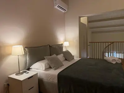 Letto o letti in una camera di EUREKA APArtment