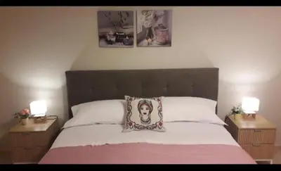 Letto o letti in una camera di La Chiocciola Apartments