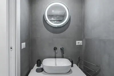 Bagno di Home Eleinad appartamento elegante a pochi passi da Ortigia