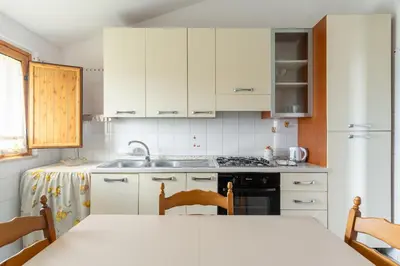 Cucina o angolo cottura di Casa degli Ulivi - Apartments by Wonderful Italy