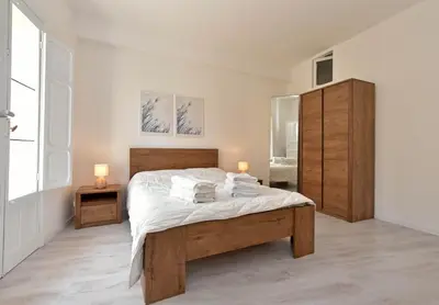 Letto o letti in una camera di Sud Casa Vacanze