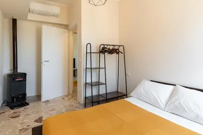 Letto o letti in una camera di Casa Verga con Terrazza by Wonderful Italy