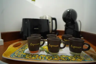 Set per la preparazione di tè e caffè presso Exclusive Catania suite