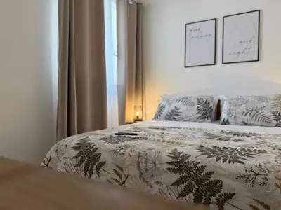 Letto o letti in una camera di AcquaLuce Home Marzamemi
