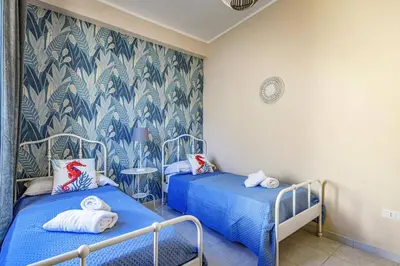 Letto o letti in una camera di Villa Marena by Villa Plus