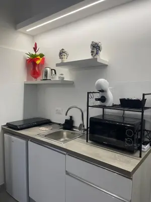 Cucina o angolo cottura di 1940 Apartment Room 2