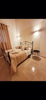 Letto o letti in una camera di Porta garibaldi holiday houses