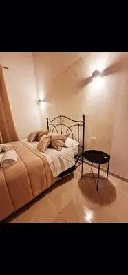 Letto o letti in una camera di Porta garibaldi holiday houses